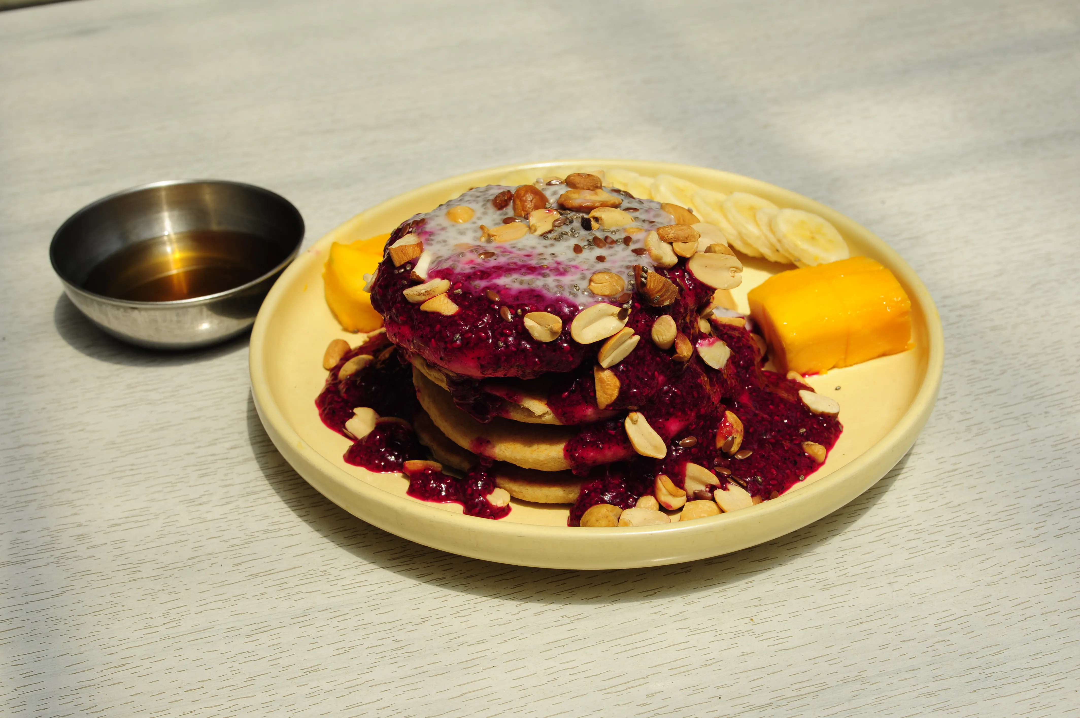 Oat coconut pancakes styled for KURUMI